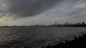 On Mumbais Marine Drive, a woman jumps into the sea to end her life while a crowd watches.