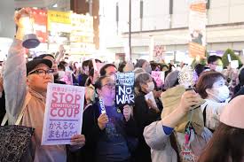 As the PM advocates for a more robust defence, anti-war demonstrations rock Japan