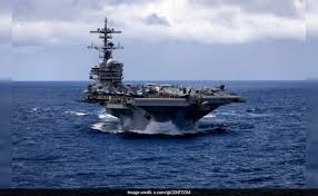 As the third aircraft carrier arrives, Trump says he 