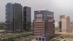 According to sources, companies establishing treasury operations in GIFT City include Adani and Arcelor.