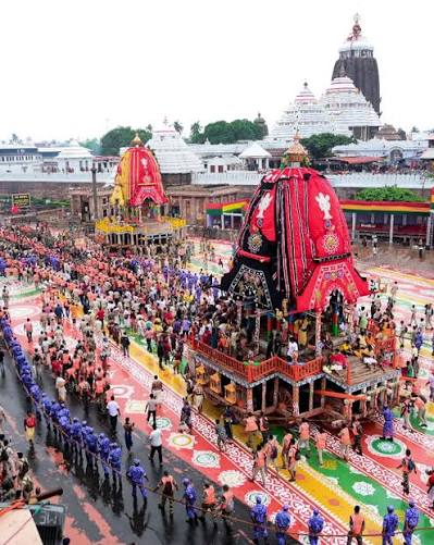 Devotees pull chariots past Puri as the Rath Yatra fervor spreads throughout Odisha