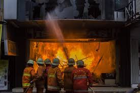 A large office building fire in Jakarta, Indonesia, claimed 20 lives, and others were thought to be trapped.