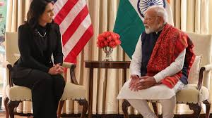 Tulsi Gabbard is met by Prime Minister Modi, who refers to her as a 