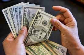 How Americans lives are silently becoming more expensive due to the declining value of the dollar